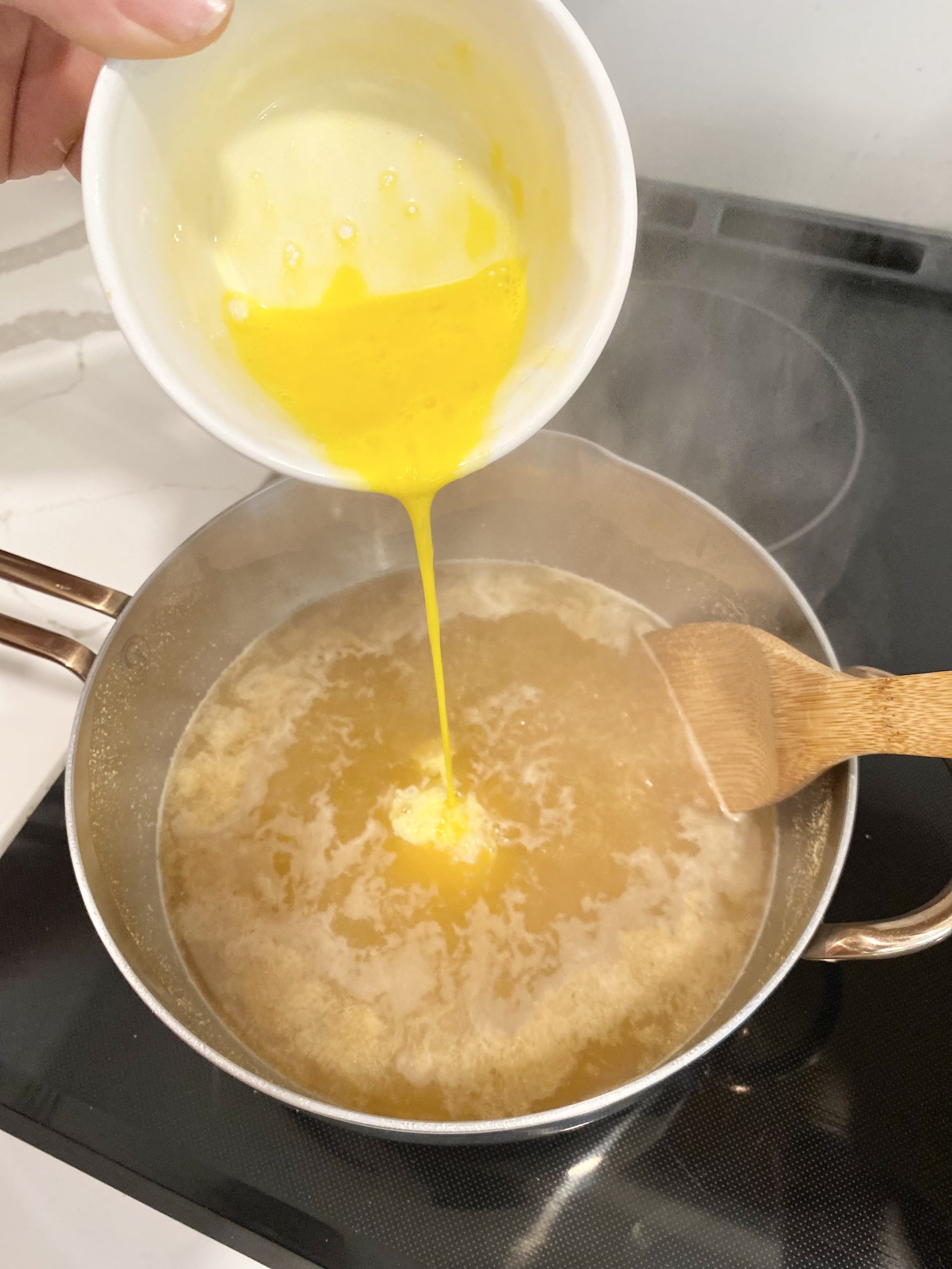 adding egg to egg drop soup